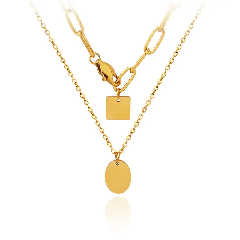 layered paperclip chain necklace with coin pendant